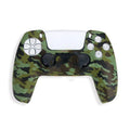 Camouflage silicone case fitted on a PS5 controller handle showing textured surface and snug fit