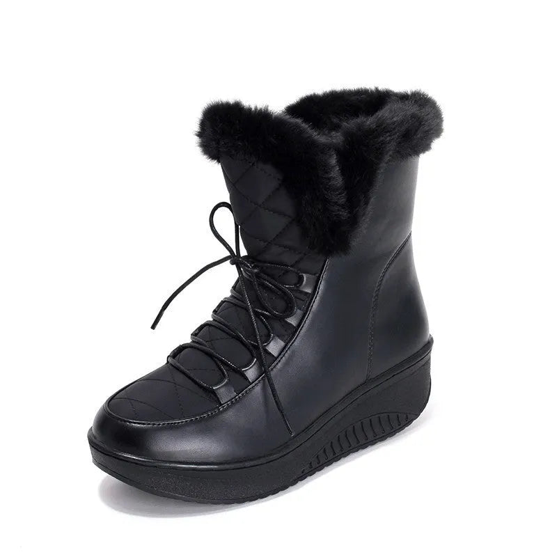 Black women's lace-up winter boots with platform sole on a white background