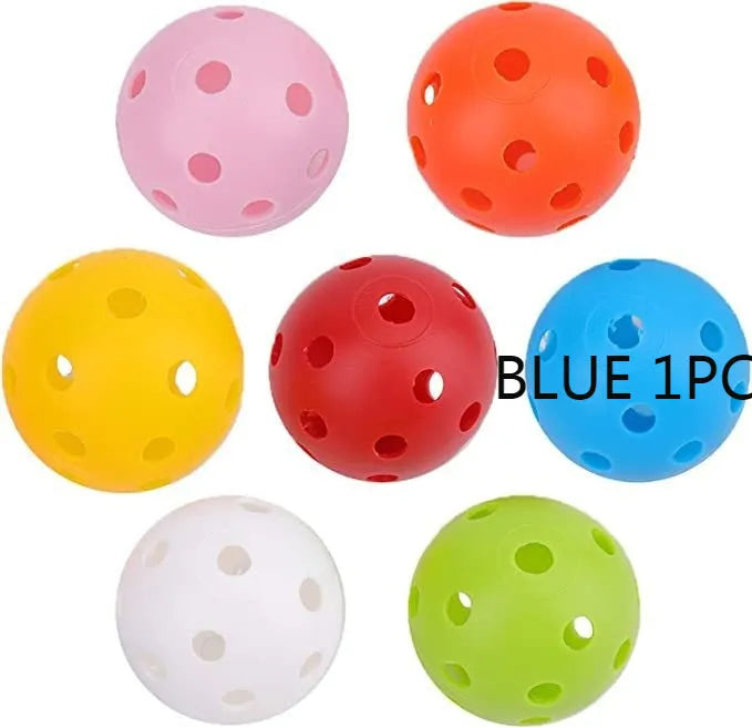 Multi-colour golf practice balls in net bag with 26-hole putting layout for skill development