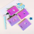 Set of four A7 spiral-bound notebooks with PP covers in different designs, showing compact 10.8 x 8.2 cm size