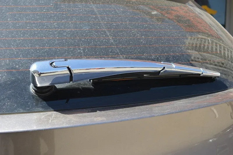 Set of four silvery ABS plastic rear wiper cover trims for 2010 Hyundai cars.