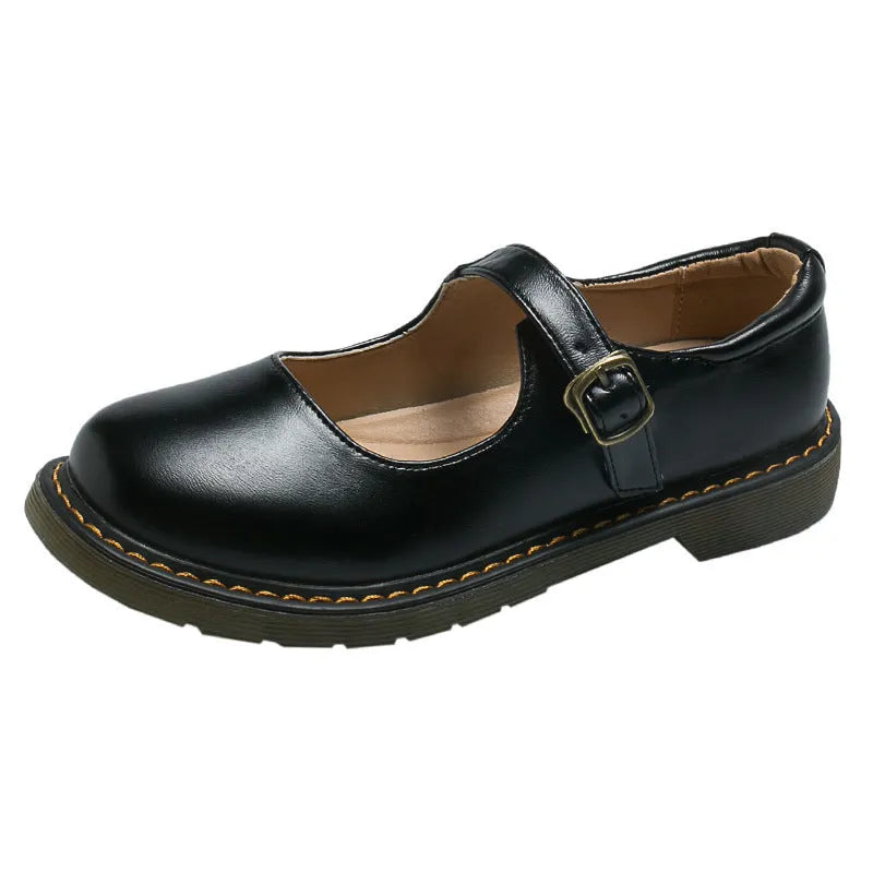 Women's solid colour round head low-cut flat retro shoes with buckle, black colour option, side view