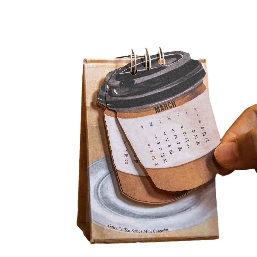 Coffee-themed 2025 mini desk calendar showing four simple modern design options