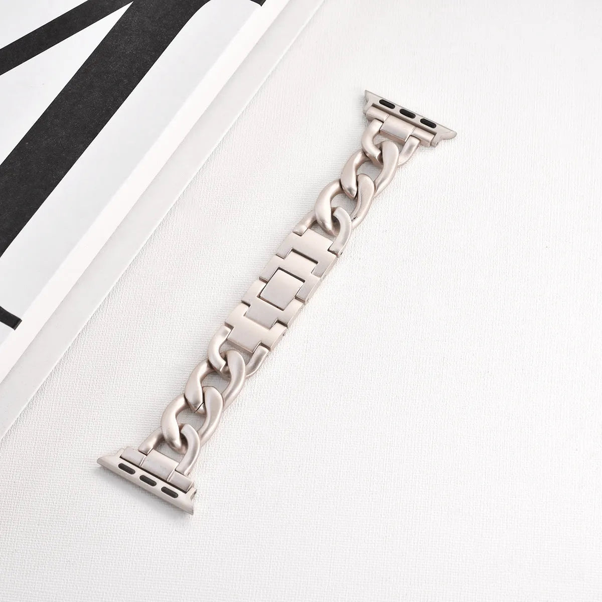 Metal denim chain replacement strap for Apple Watch in silver, showing 22mm lug width.