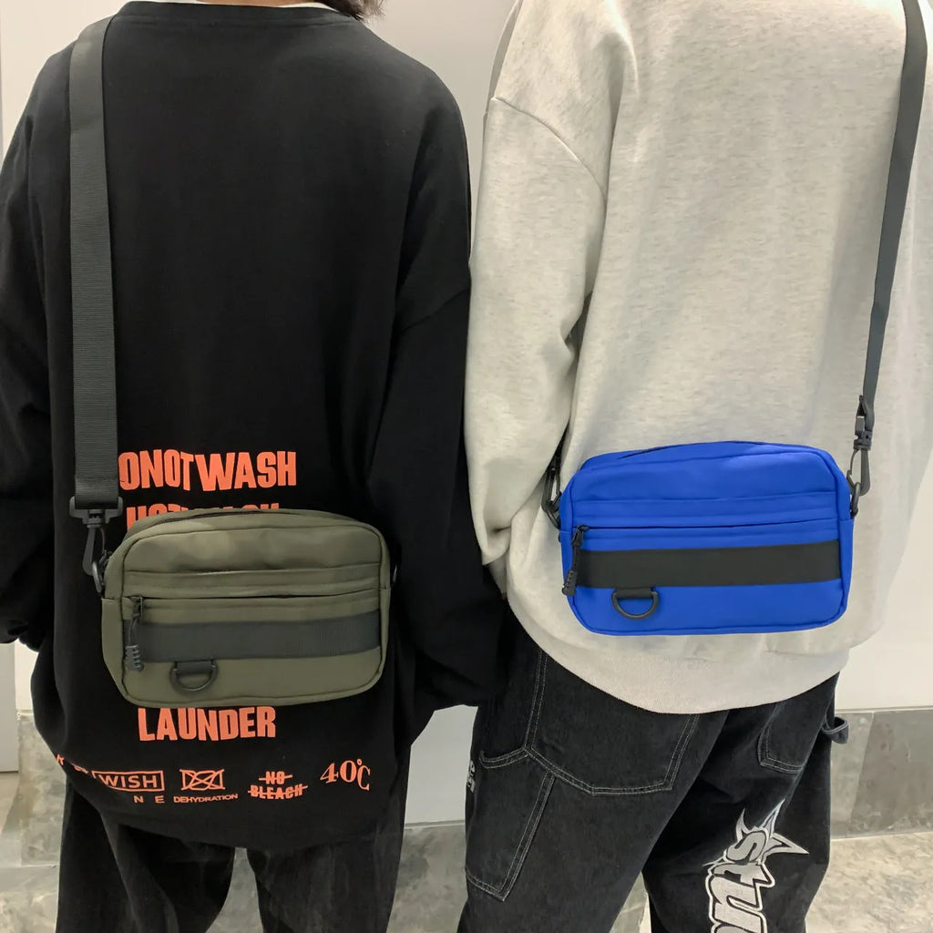 Men's black nylon messenger bag with sewing thread details measuring 22cm length for daily crossbody wear