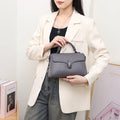 Korean commuter women's cross-body bag genuine leather oval shape sandwich pocket 21x18x9cm