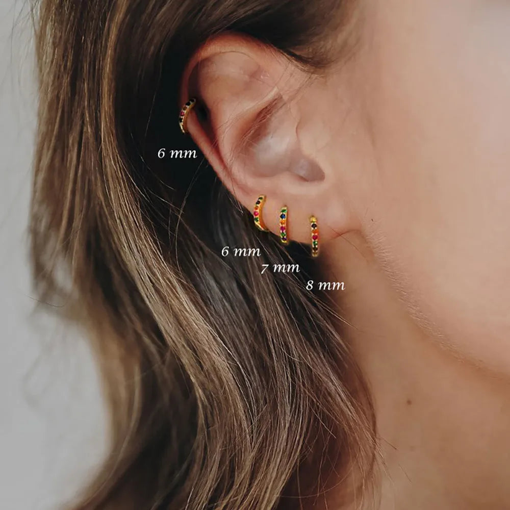 Circle geometric zircon stud earrings in gold, rose gold, or silver colour on a copper base.