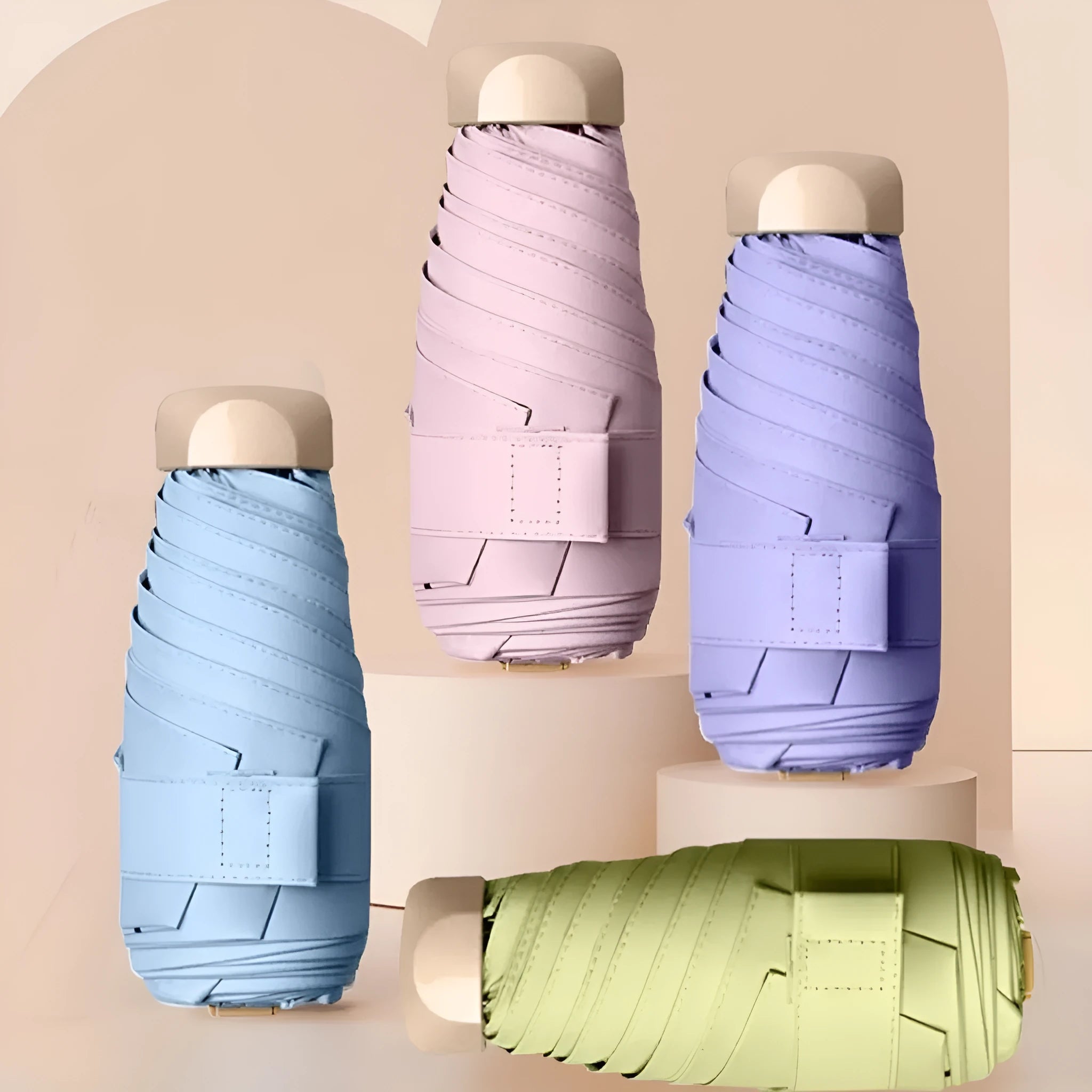 Five-fold compact umbrella with gradient vinyl canopy and manual open handle.