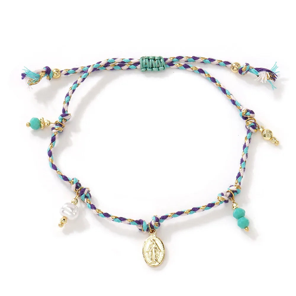 Ethnic style women's bracelet handmade from colourful braided rope with woven carrying strap tag design