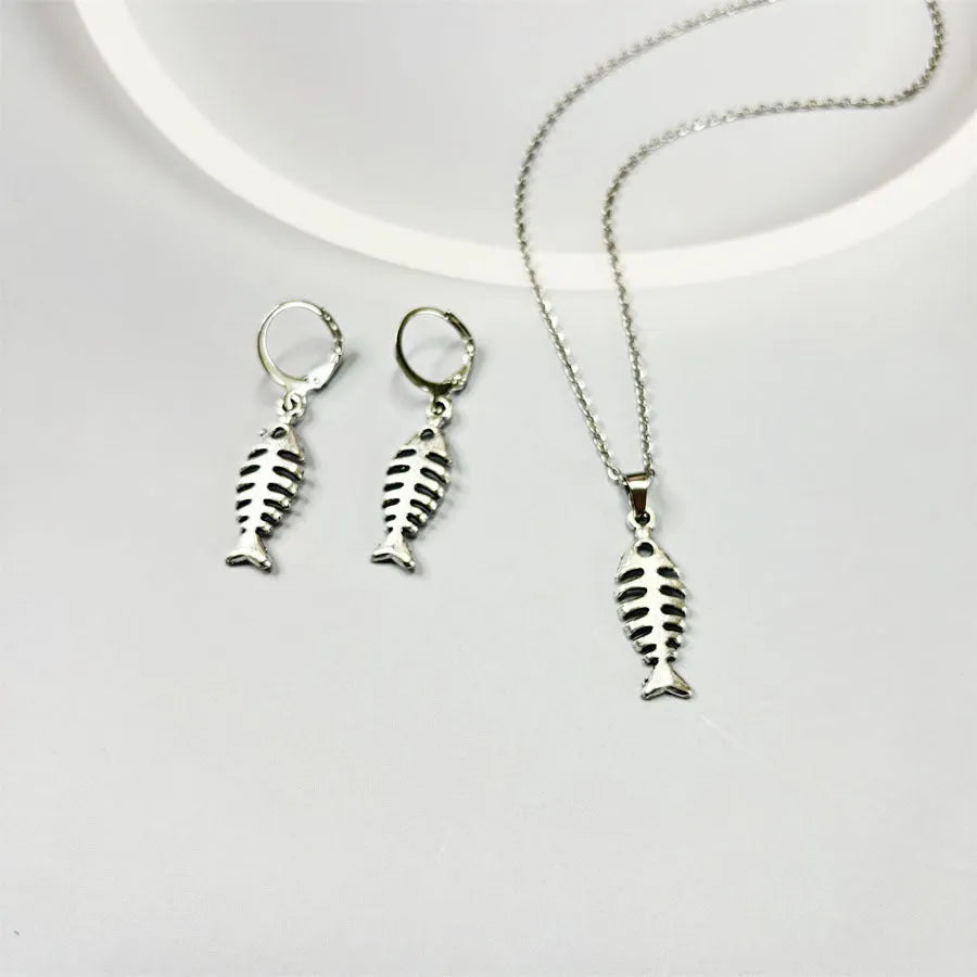 Retro fishbone design alloy necklace and matching earrings set on a dark background.