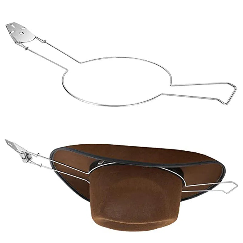 Brown chrome-plated metal car-shaped hat and coat stand on a table.