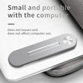 Silver aluminium bracket holding a mobile phone flush beside a laptop screen on a desk.