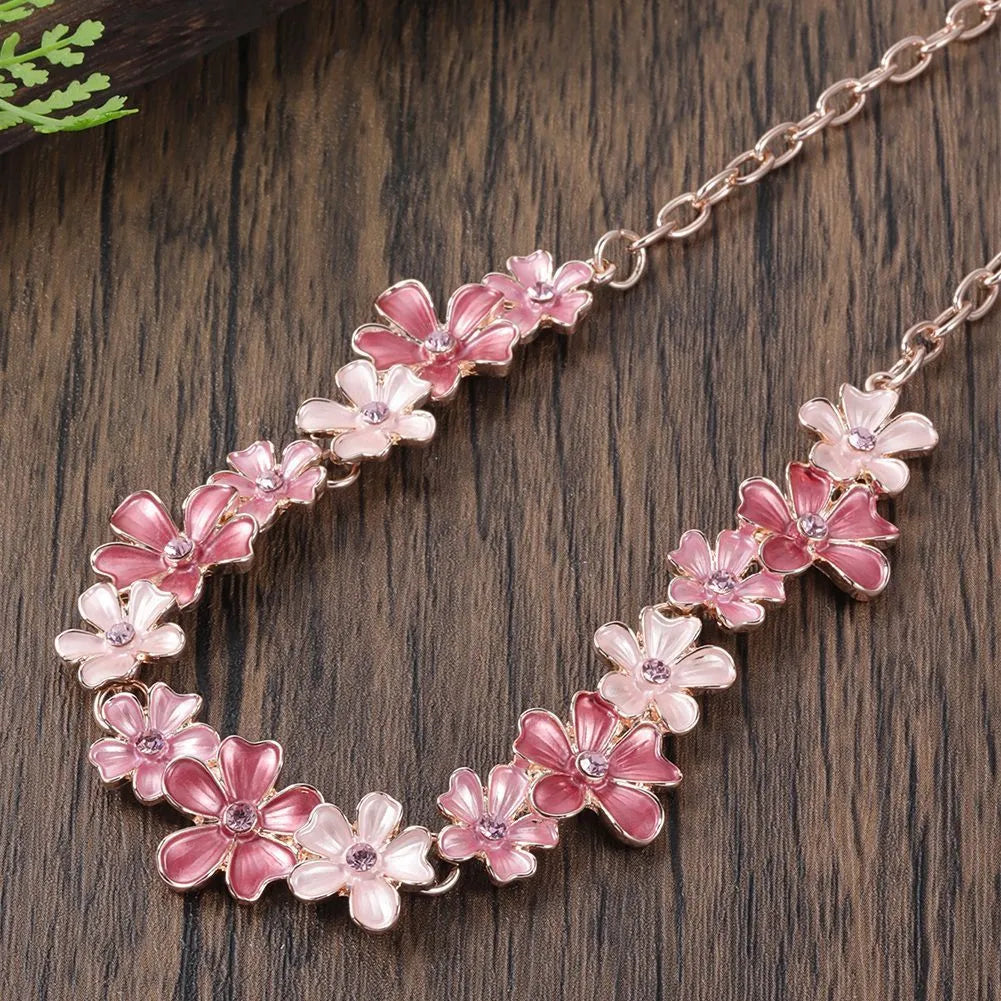 Zinc alloy flower stitching colourful oil necklace and earring set for women with cross chain style