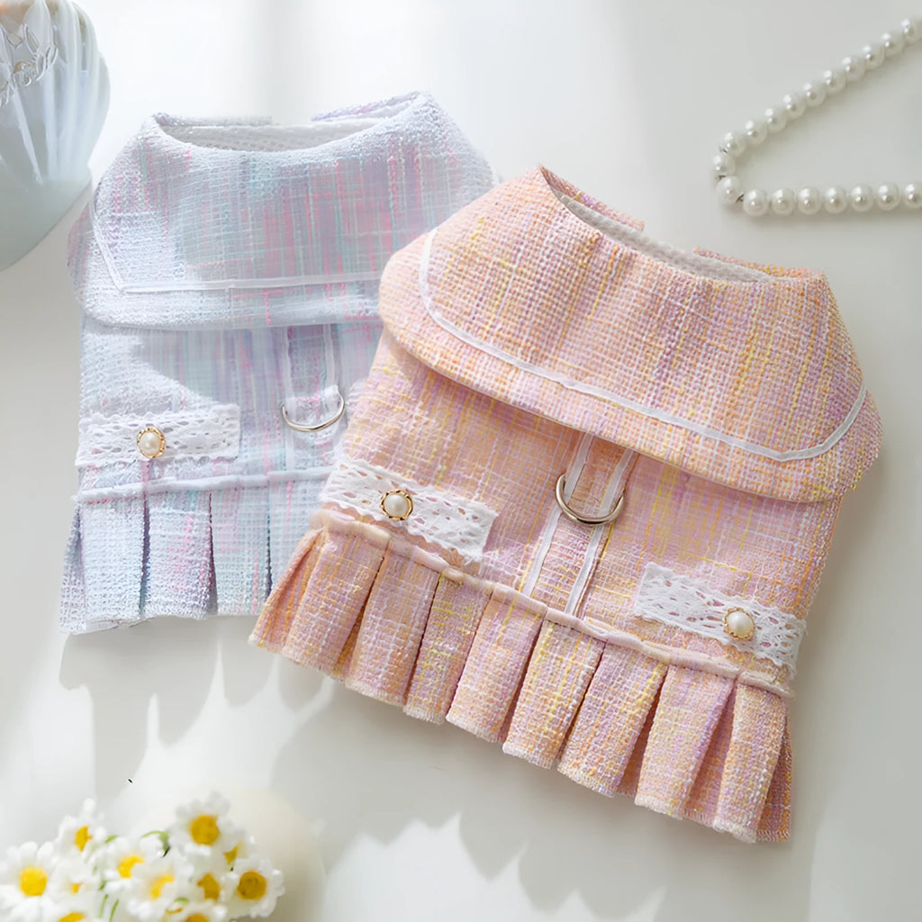 Purple and pink lightweight polyester clothing for a small dog or cat on a hanger.