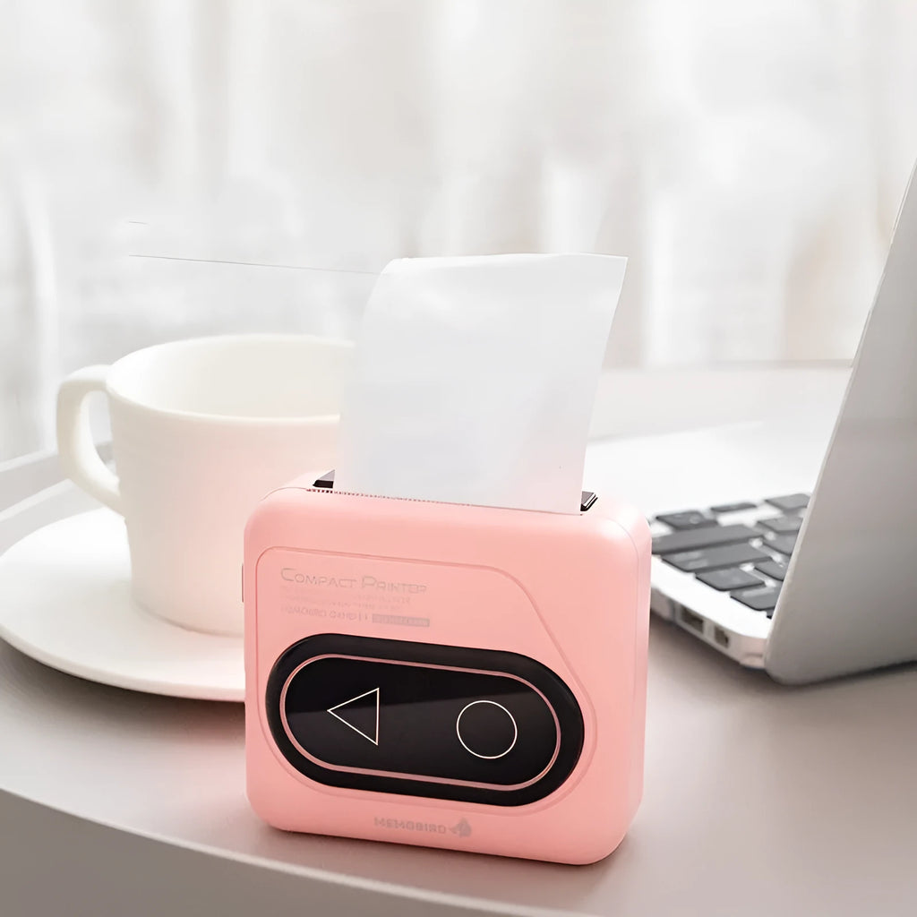 Avocado green Bluetooth mini thermal printer with mobile phone showing printed photo