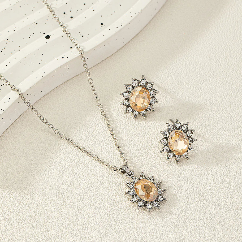 Sunflower-themed zircon necklace and matching ear stud set in alloy with electroplated finish