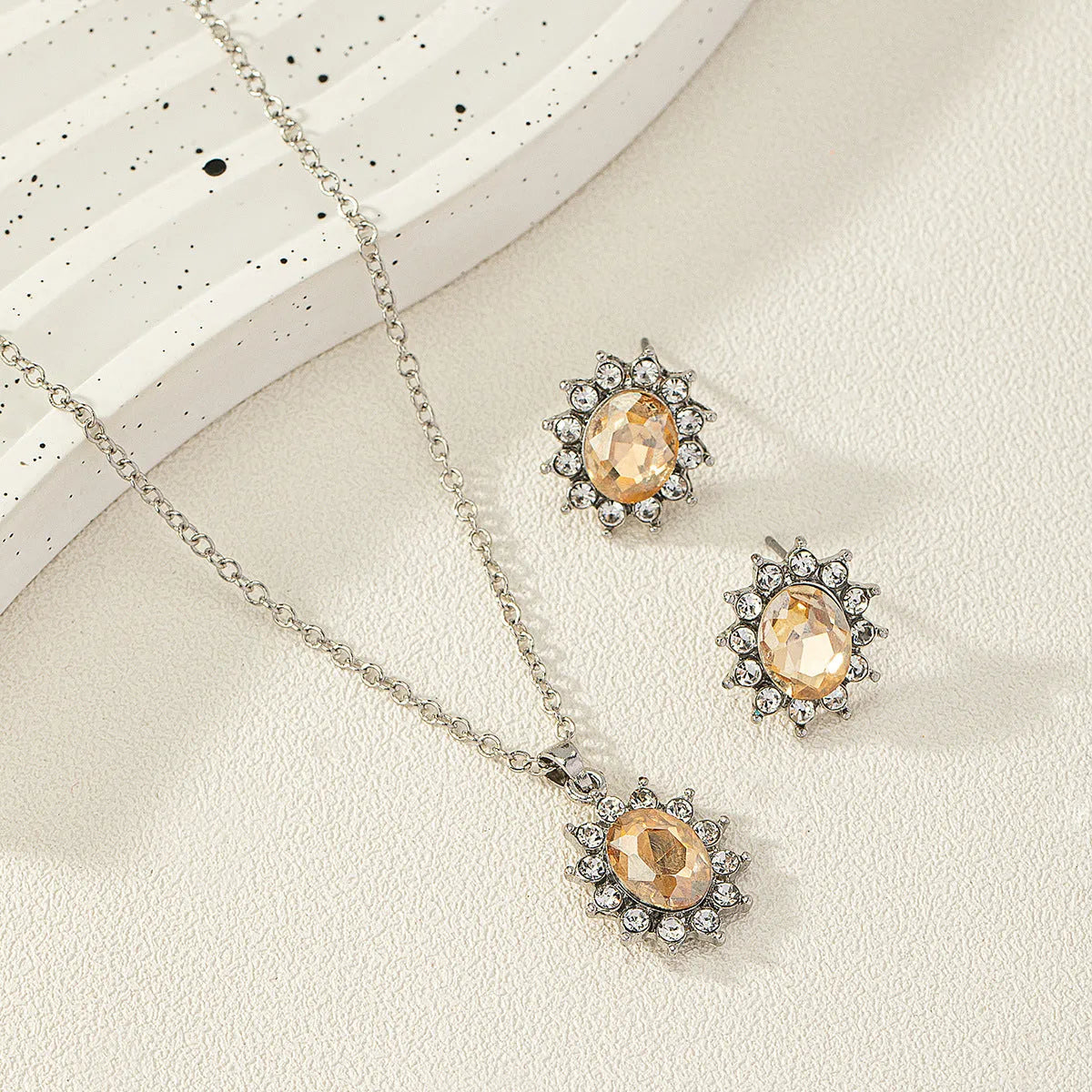 Sunflower-themed zircon necklace and matching ear stud set in alloy with electroplated finish