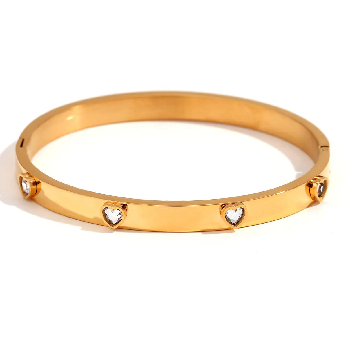 Stainless steel women's bracelet with a micro-inlaid peach heart in green or white diamond colour.