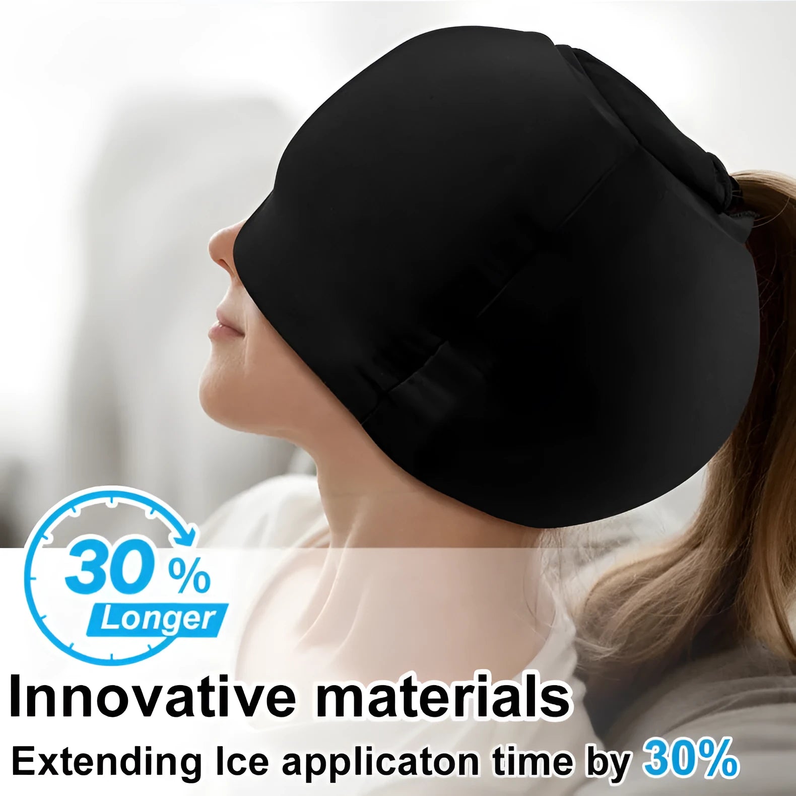 Simple solid colour cold compress cap in black, shown fully enclosing a head.