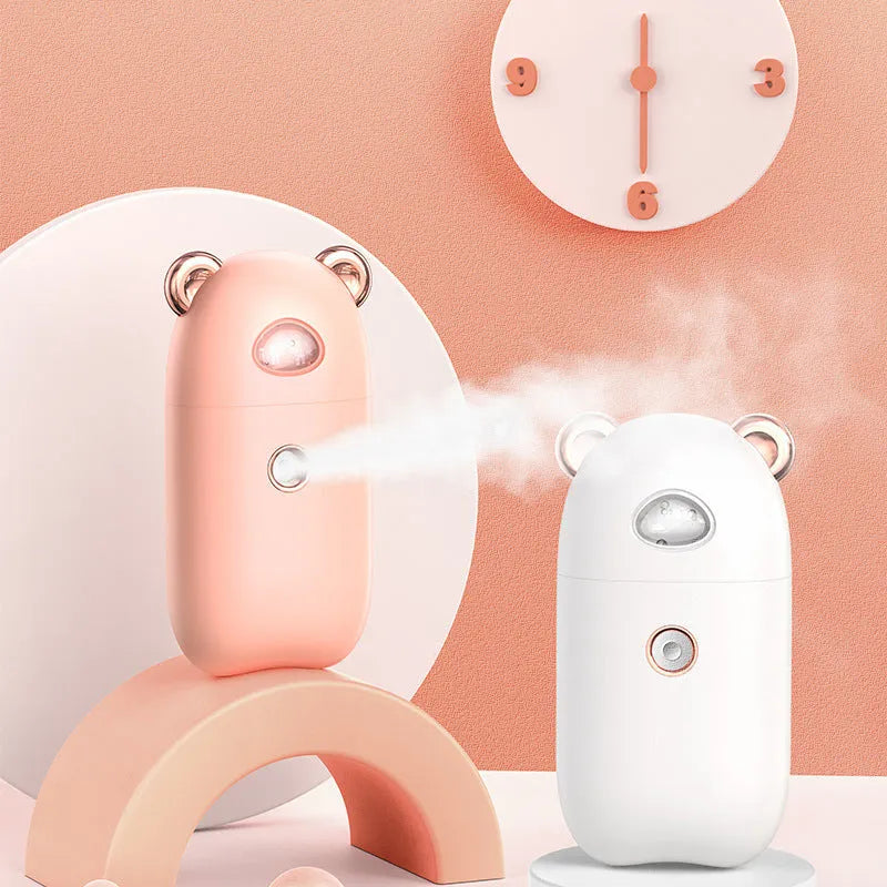 USB rechargeable portable hand humidifier and face steamer in white with cold spray mist