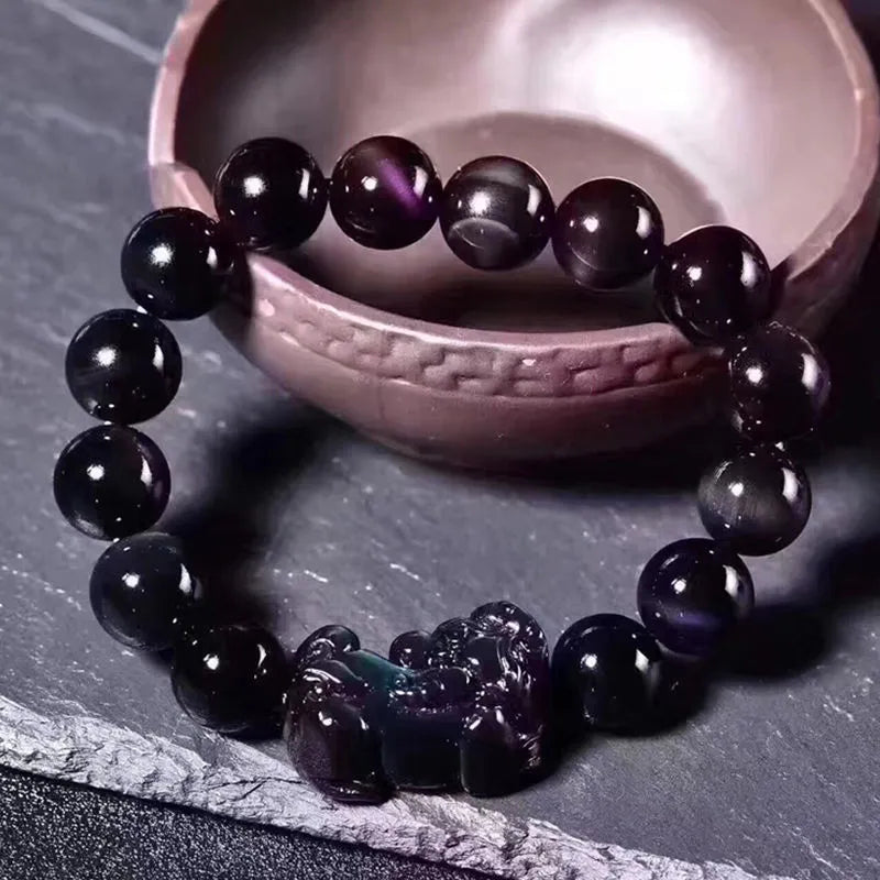 Natural ice colour eye obsidian crystal bracelet with banded patterns, shown in various bead sizes.