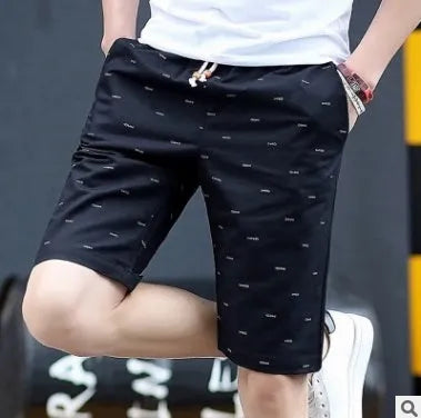 Men's thin cotton summer capri shorts in multiple colours on a size chart background