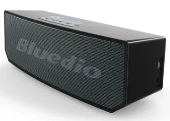 Black cloud smart speaker with 52mm driver showing micro-USB charging port