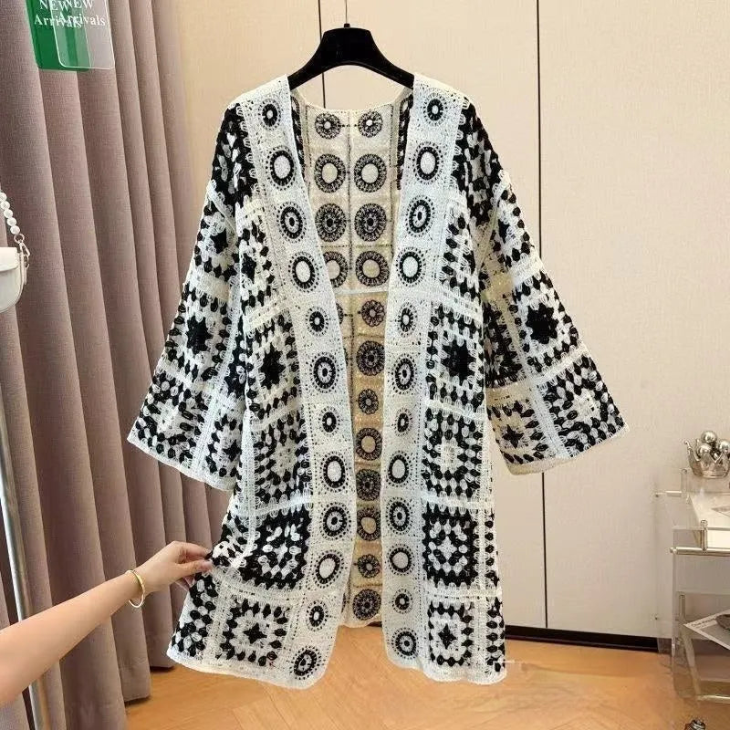 Ladies' loose embroidered thin knit cardigan in brown, front view on model