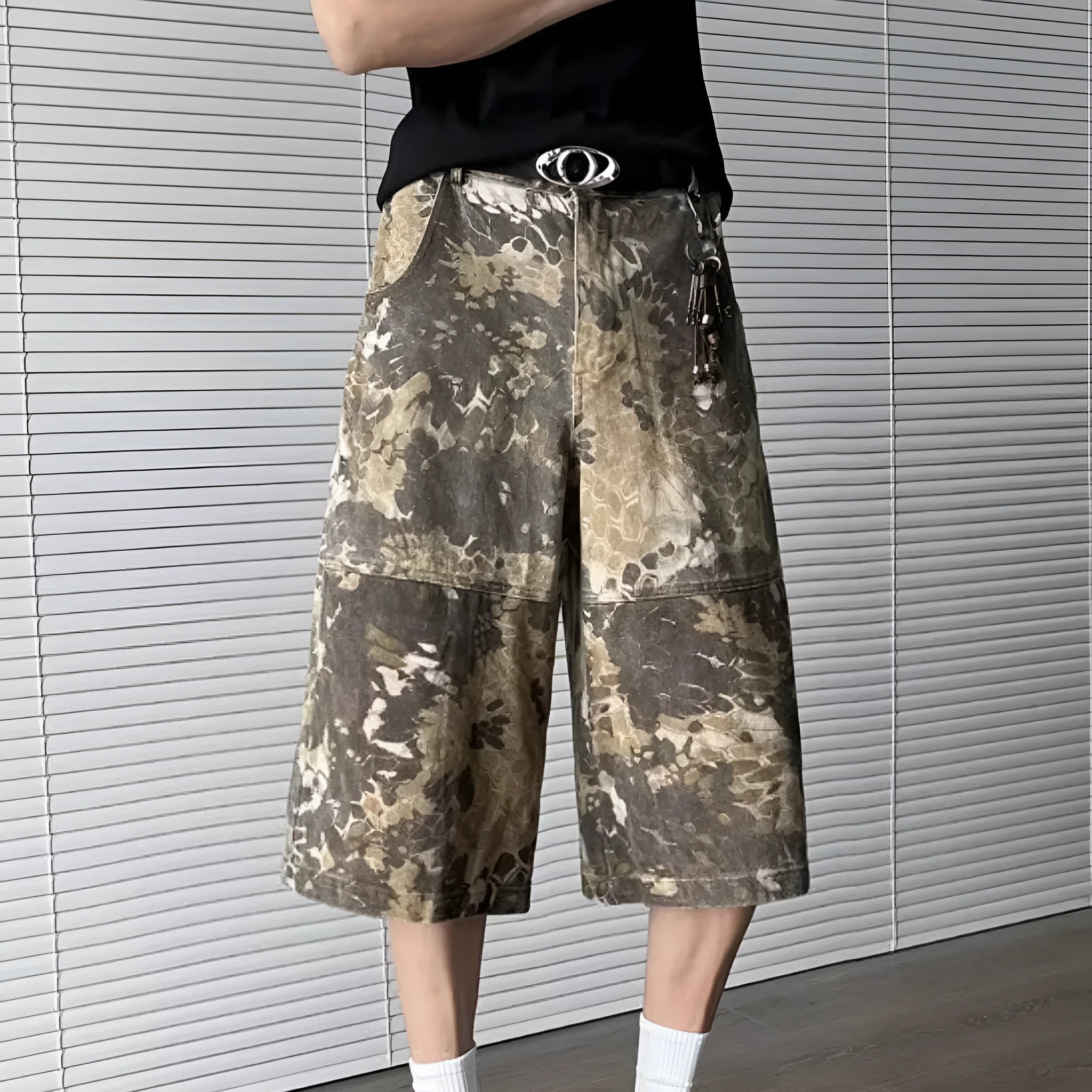 Yellow snake pattern camouflage cropped jeans with cotton denim construction showing tooling detailing