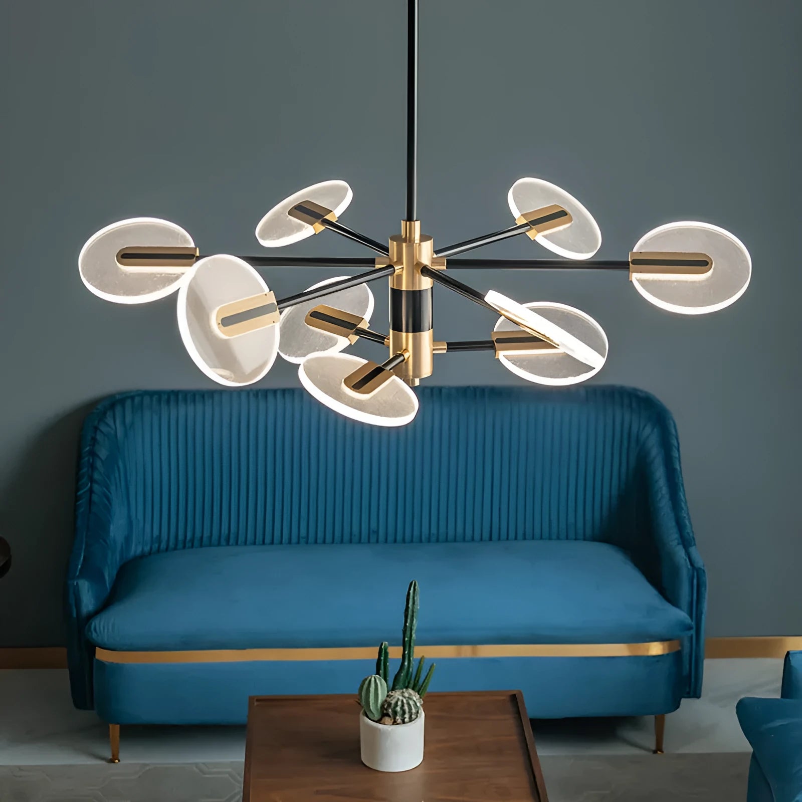 Nordic style iron and acrylic LED chandelier pendant lamp with multiple heads for ceiling mounting.