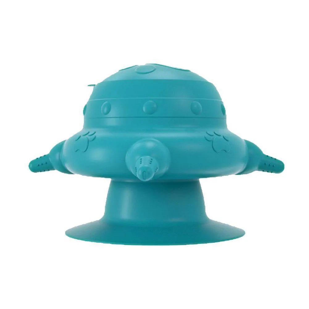Pink silicone pet nursing milk feeder bowl with four pacifiers on a flat base.