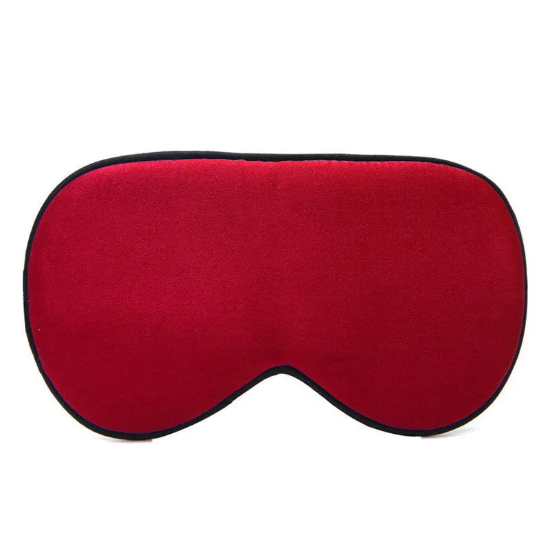 Double-sided mulberry silk eye mask in champagne colour with embroidered print.
