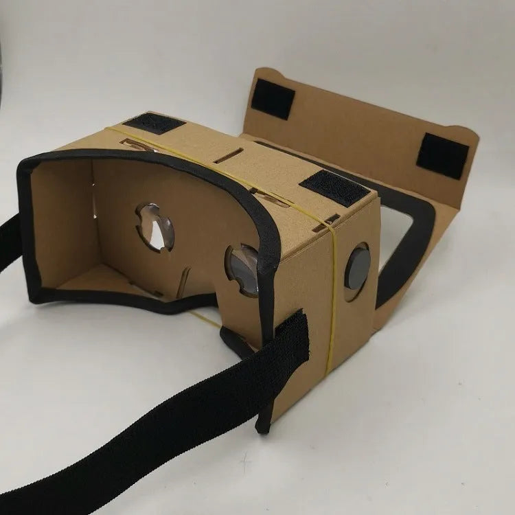 Pink cardboard VR glasses with 3D lenses and adjustable rubber band head strap for smartphones