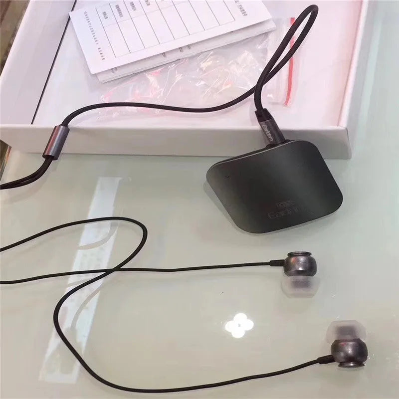 Bluetooth lavalier headphones with audio receiver showing colour options and lavalier clip design