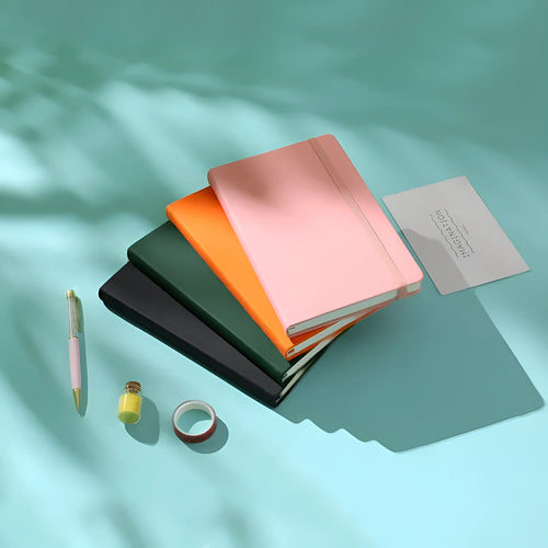 A5 tactile PU hardcover notebook in black with adhesive binding and 100gsm white paper