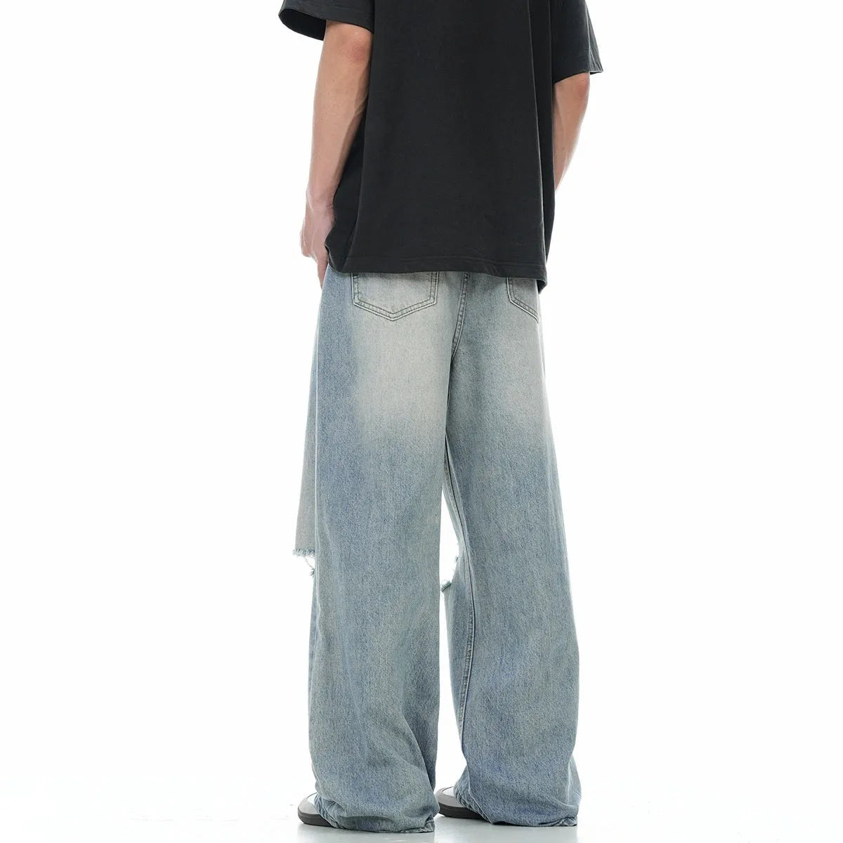 Men's blue straight-leg jeans with retro ripped detailing and an adjustable waistband