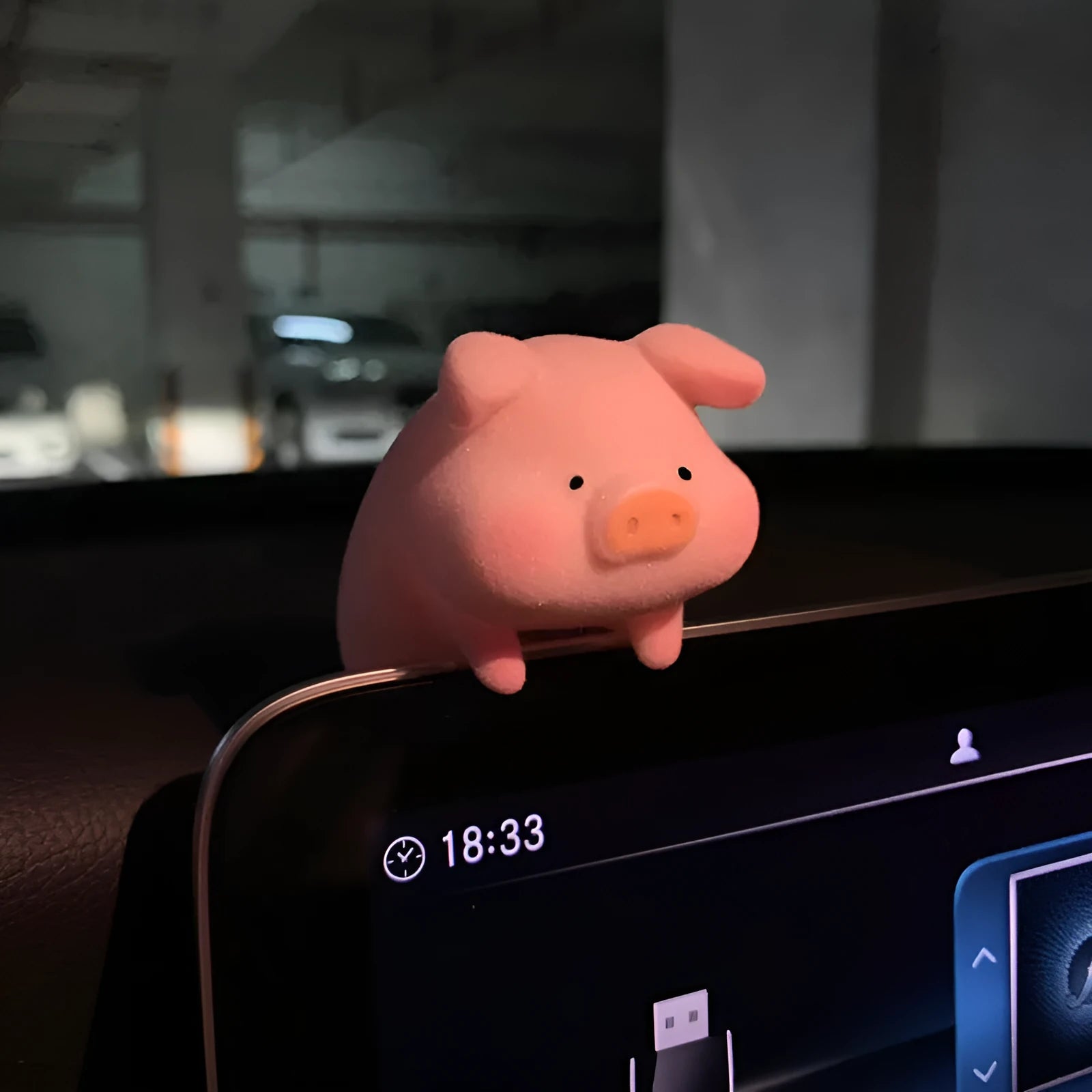 Cartoon pig character resin car ornament for dashboard or windscreen decoration.