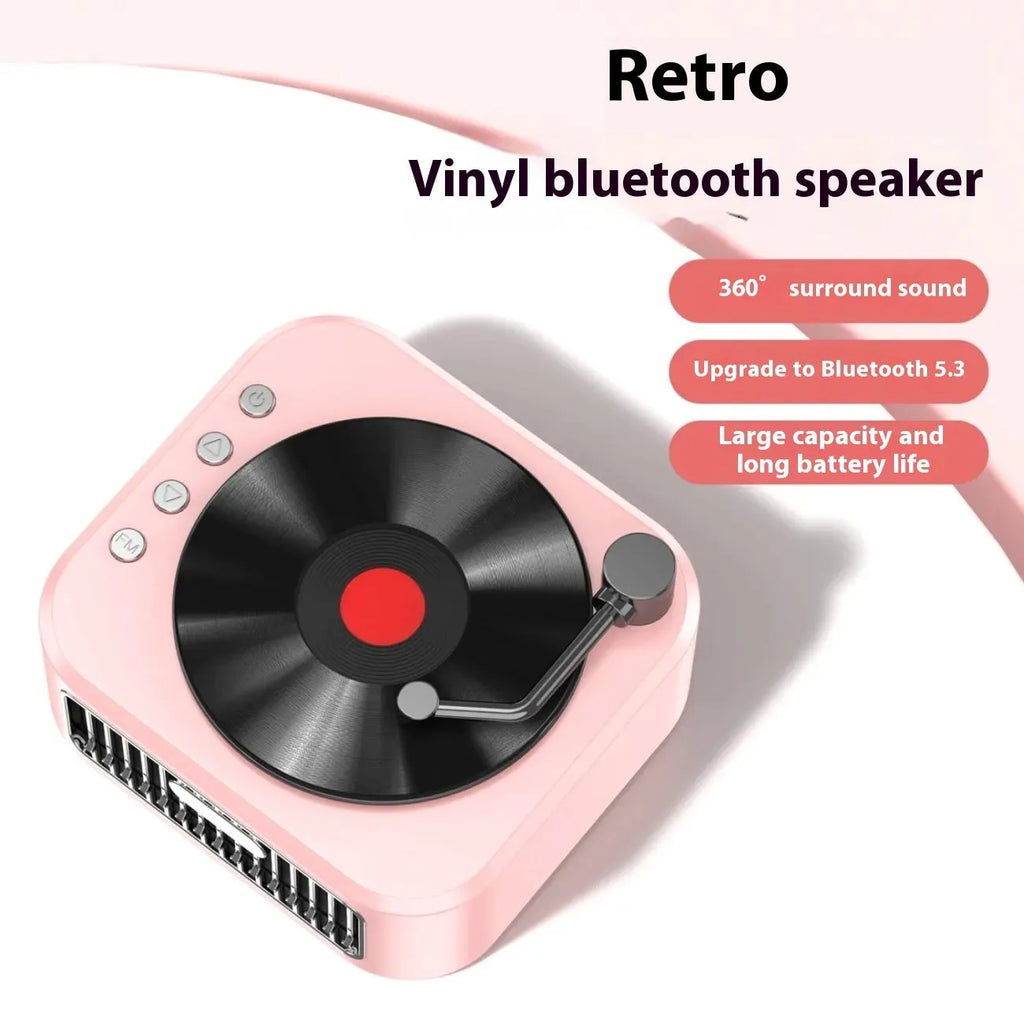 Retro jukebox-style Bluetooth speaker in sunset pink with vinyl record design and karaoke microphone.