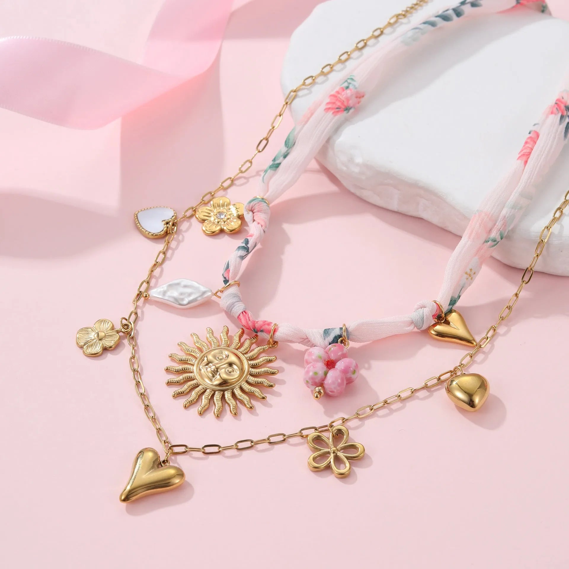 Gold plated stainless steel necklace with geometric sun pendant on adjustable 41-50cm chain