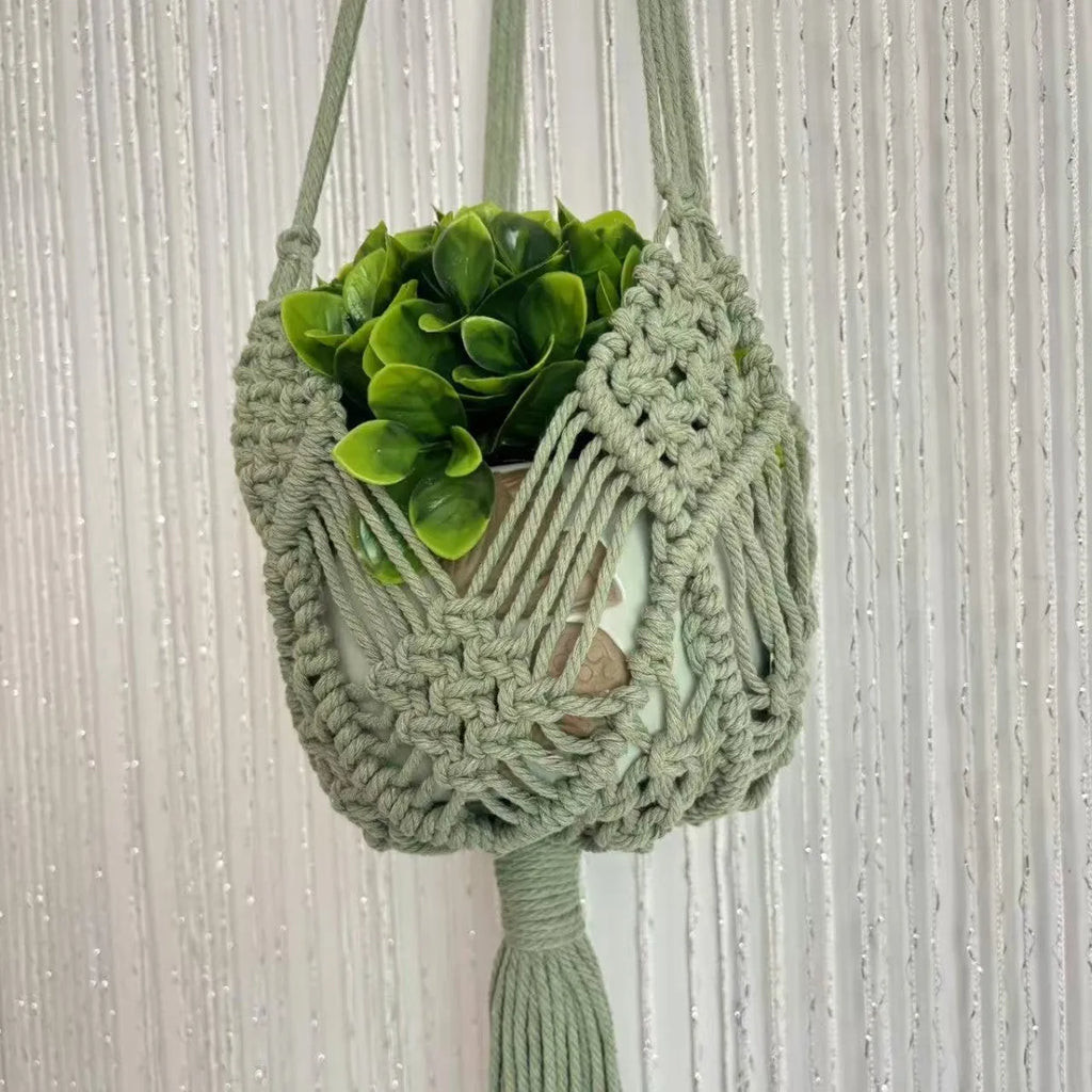 Hand-woven cotton polyester flower pot net with extension cord in a choice of seven colours.