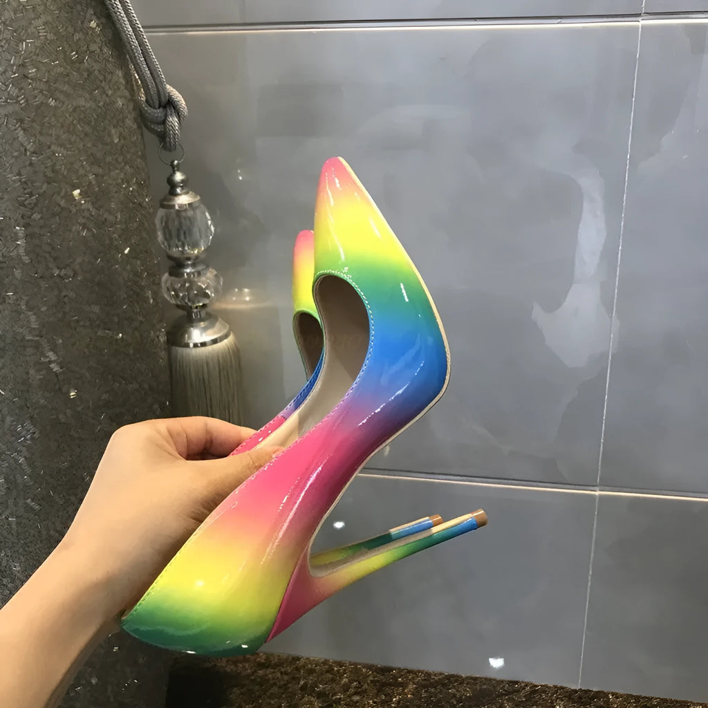 Rainbow coloured patent leather pointed toe high heels with thin ultra-high heel.