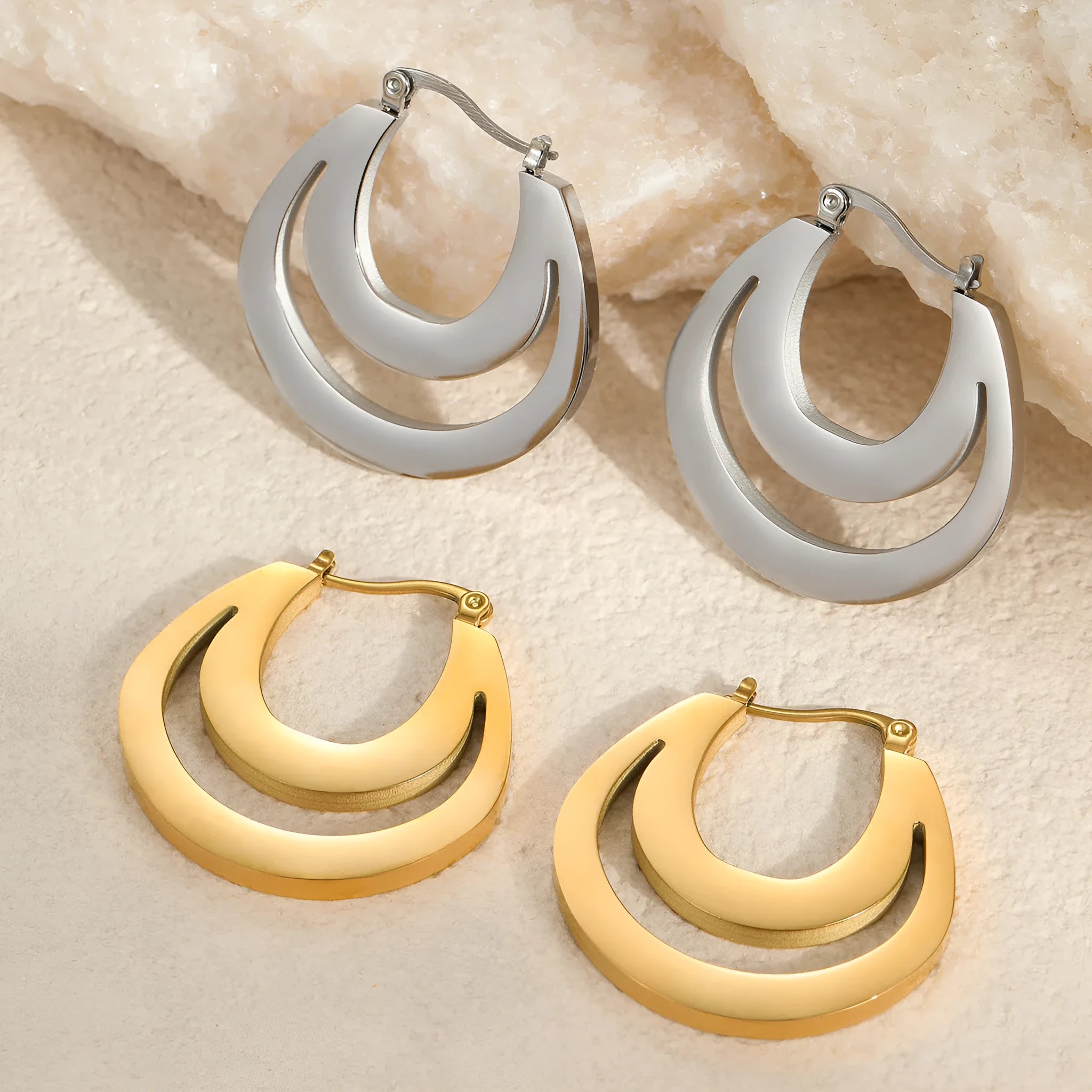 Geometric gold plated French earrings with round elements on stainless steel base