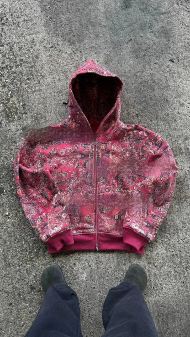 A man's loose-fitting red hooded zip-up coat with long sleeves, shown on a size chart.