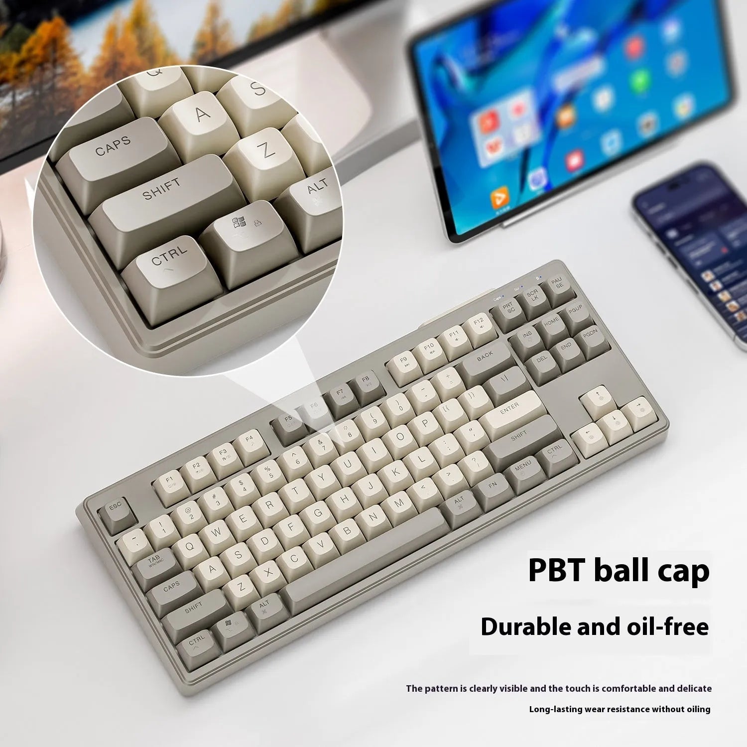 Free Wolf M87 wireless dual-mode keyboard in blueberry colour on a desk with USB receiver and cable.