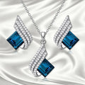 Women's necklace and ear stud set with cross chain design and glass pendant jewellery