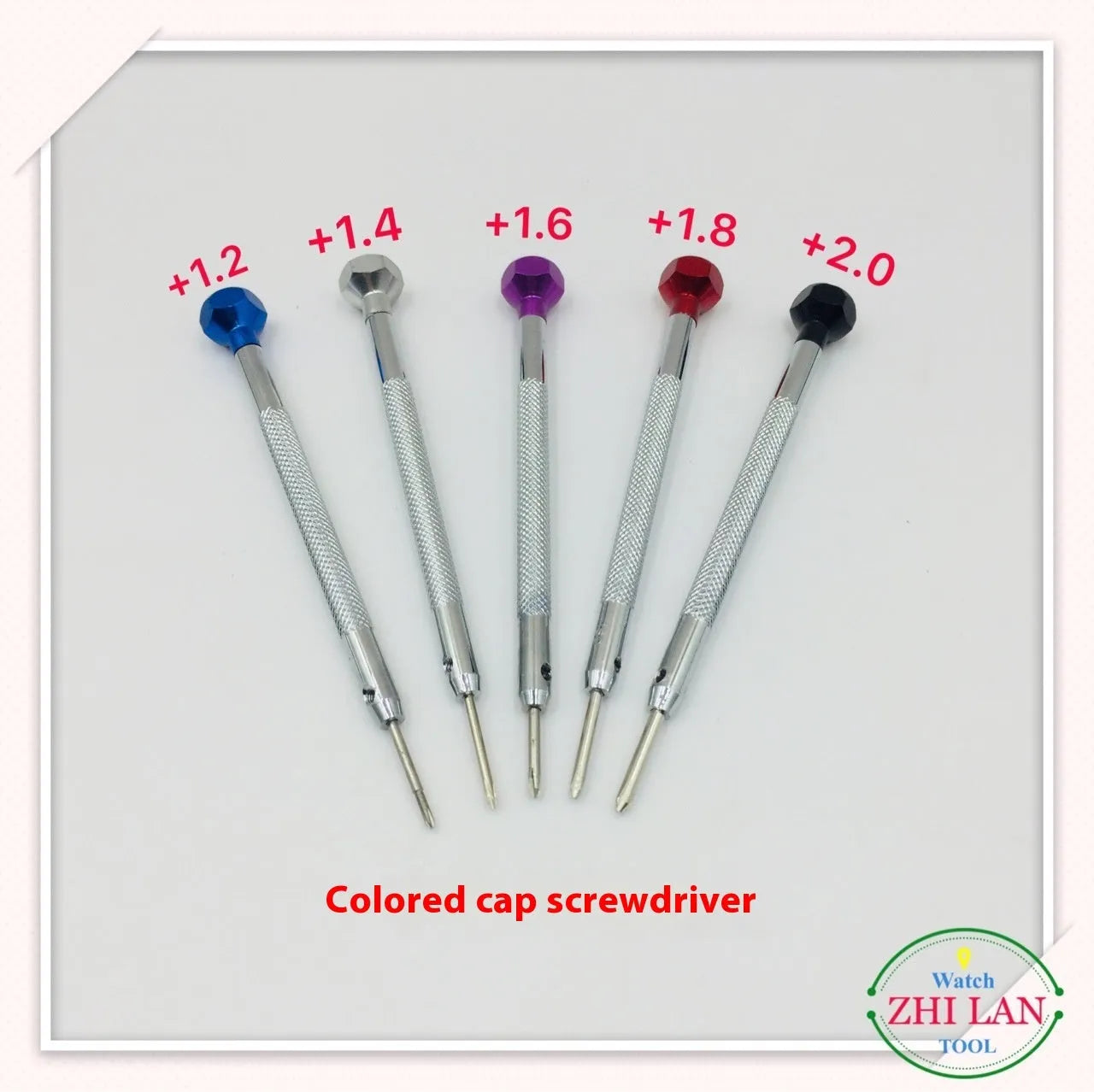 Six colour-coded watch repair screwdrivers with copper handles stored in an open aluminium case.