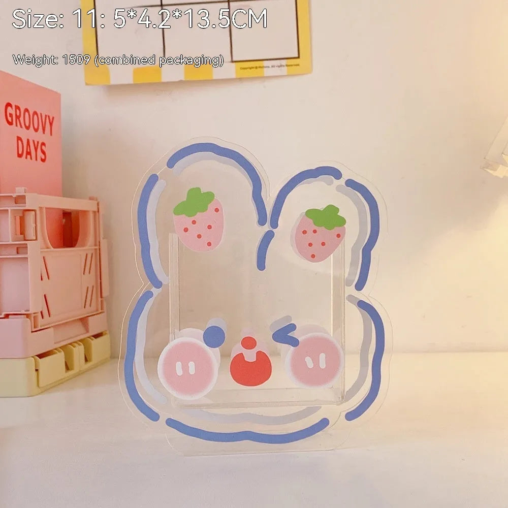 Clear square acrylic stationery storage box with lid in cute character design on desktop