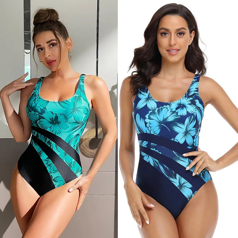 Women's conservative one-piece swimsuit in a blue printed design on a mannequin.