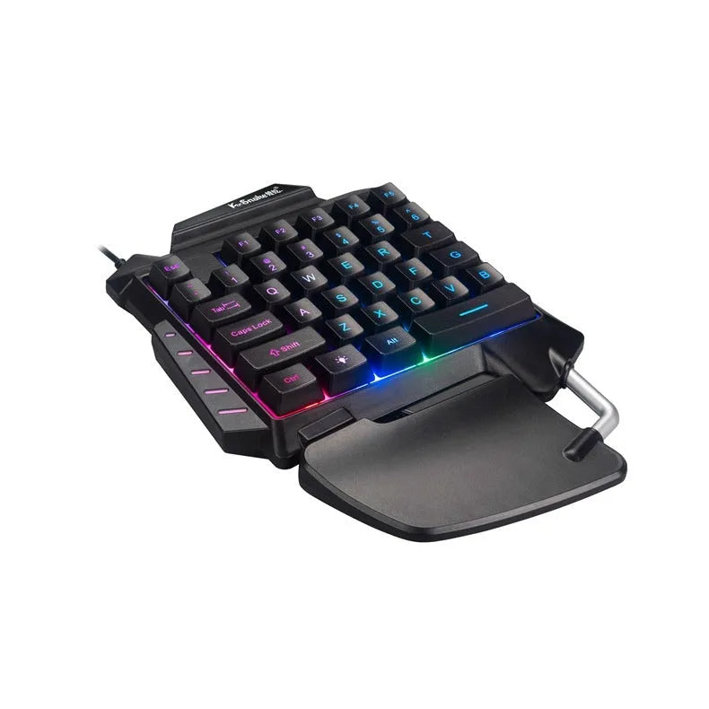 Black one-handed gaming keyboard with programmable shortcut keys and integrated hand rest for left-handed battle royale gamers