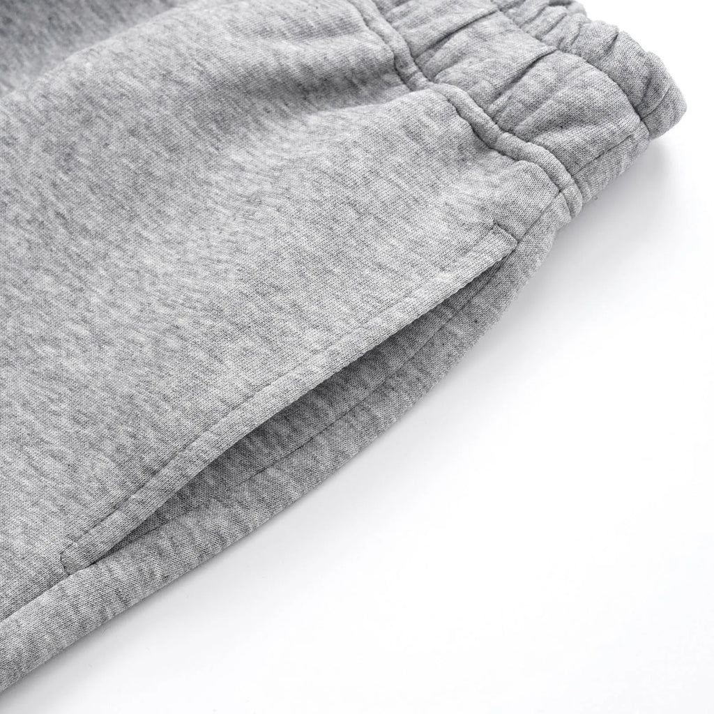 Men's straight-leg cotton trousers in solid colour with elasticated waistband